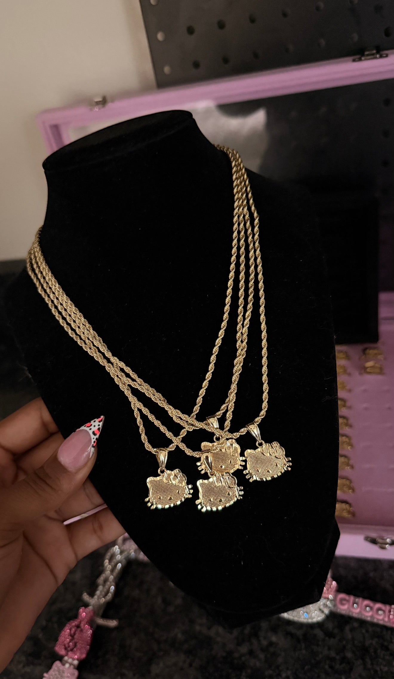 small hk face necklace image 0